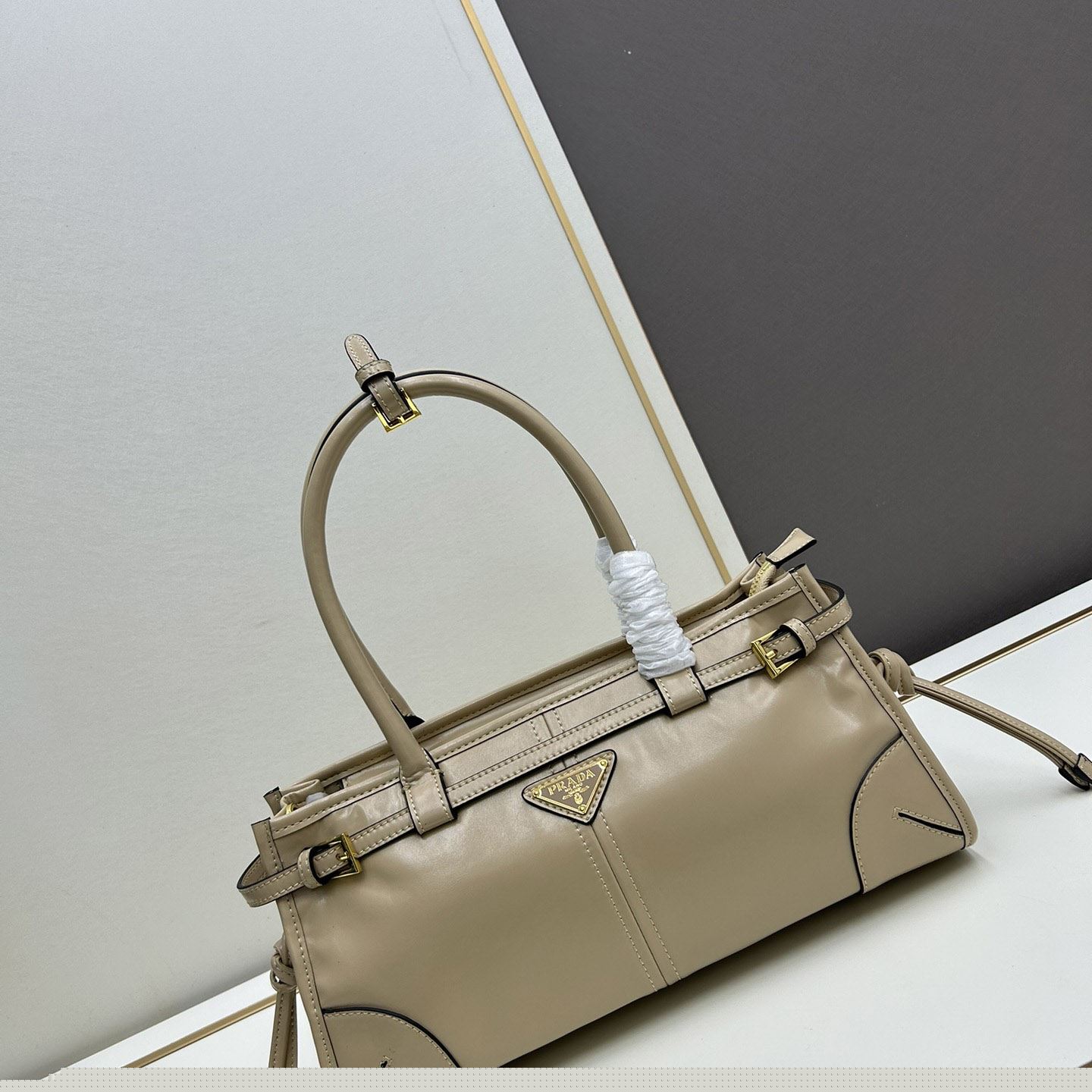 Pra*a top handle bags